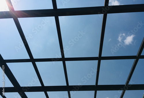 Blue Sky view from Metal grid - Stock Image