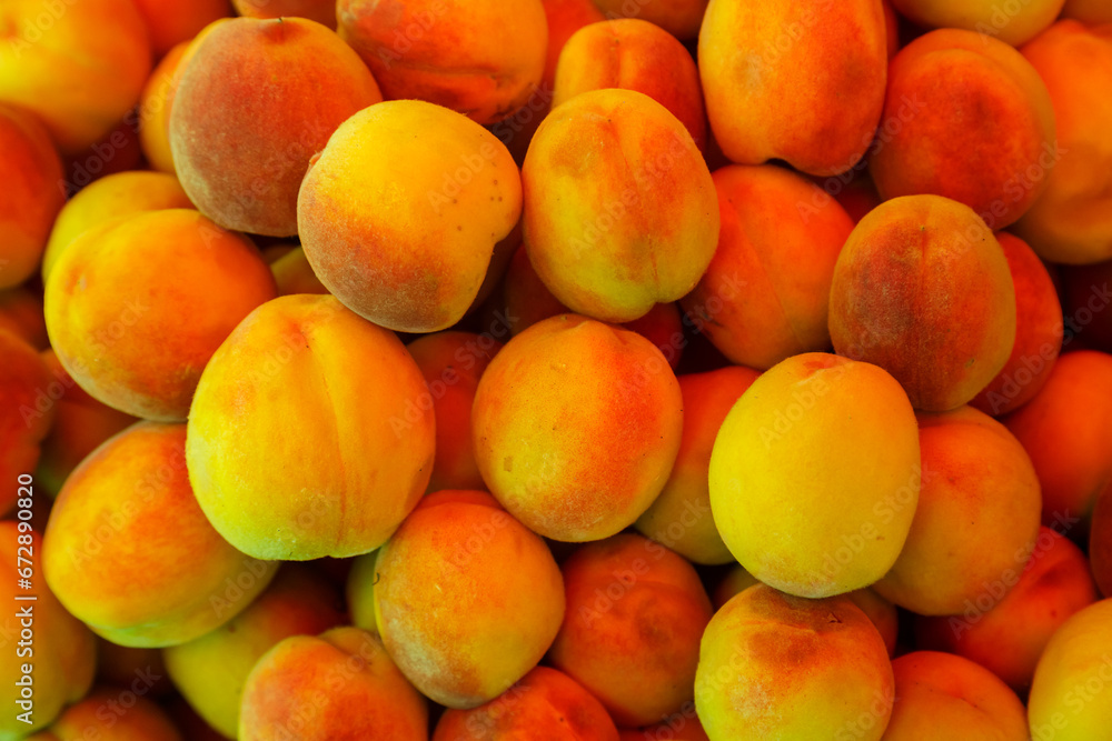 Peaches fresh juicy ripe golden scattering a lot Peaches fresh juicy ripe golden scattering a lot