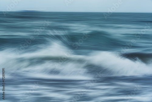 Abstract Intentional Camera Movement of Ocean Waves Moving Creating a Painterly Texture Effect.