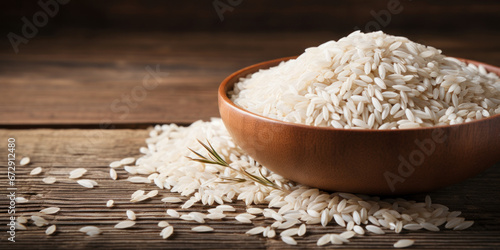 Wooden bowl full of white rice. photo