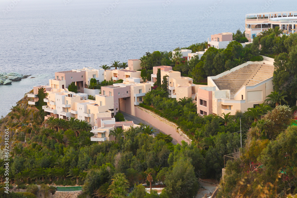 Athina Resort Palace Hotel. View of Agia Pelagia resort in the mountains of Crete in Greece at sunset. Mades, Ligaria. 
