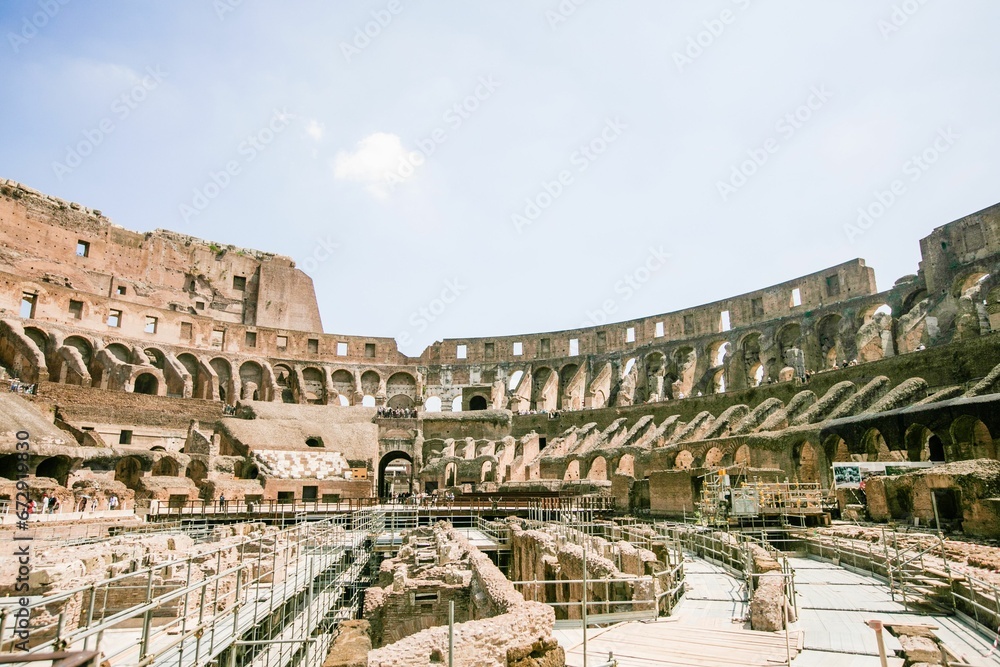 Expansive view of the inner part of the Colosseum on a sunny day. Rome, Italy.