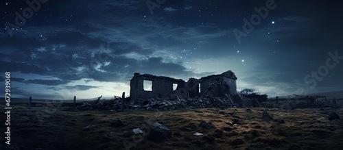 Manipulation of a photograph featuring a desolate dilapidated building and the eerie evening sky