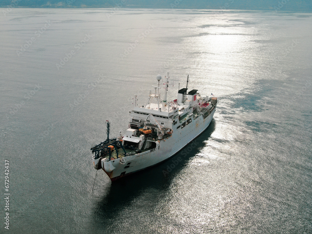 Aerial view of freight ship with cargo containers. Aerial view of freight ship with cargo containers.