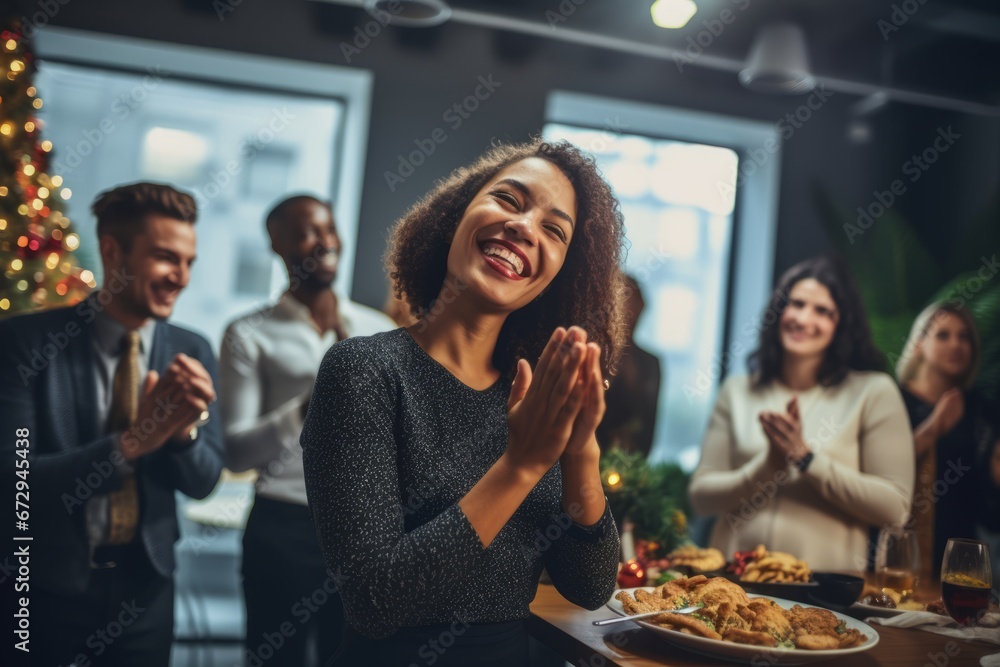 Fototapeta premium A Heartwarming Scene of Diverse Workers Sharing Gifts and Celebrating the New Year Together in Their Festively Decorated Office