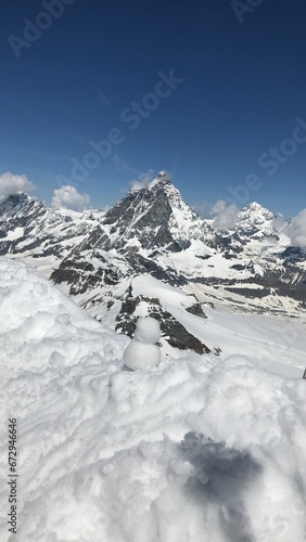 Scenic landscape of a mountain slope with snow blanketing the terrain © Wirestock