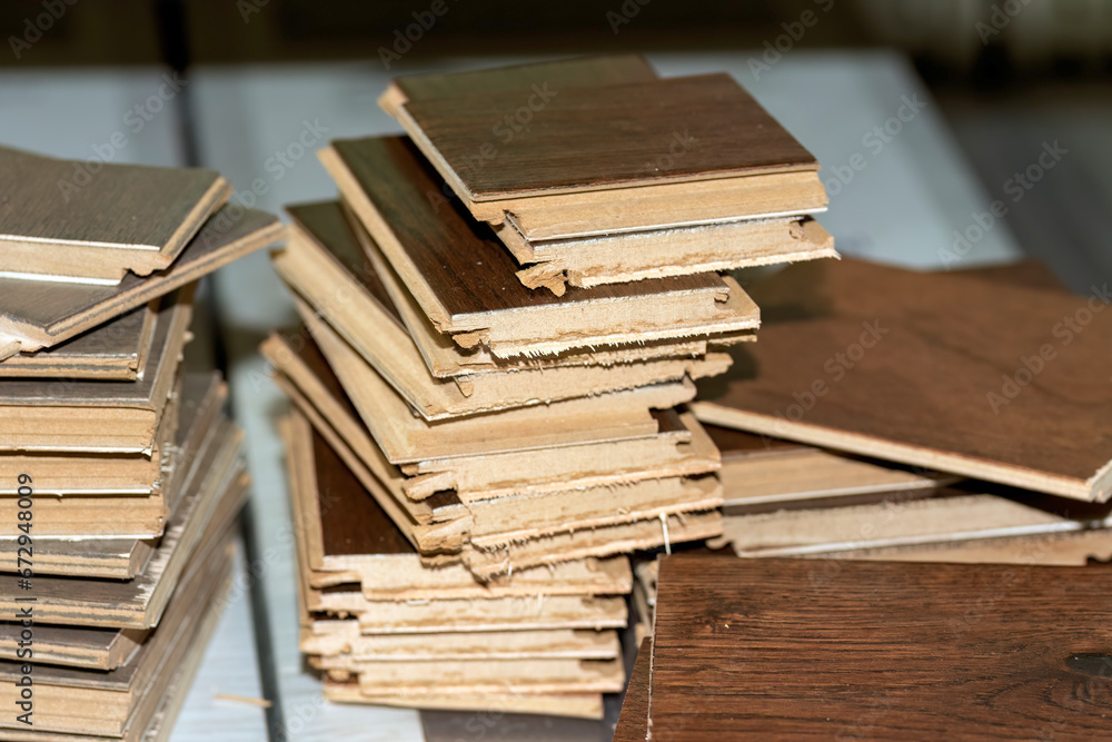 Fototapeta premium Remains of cut wood when working on a new floor.