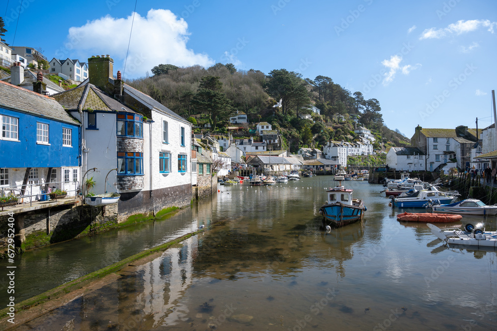 Boats in the harbor at Polperro, a charming and picturesque fishing village in south east Cornwall. A beautiful small fisherman village.