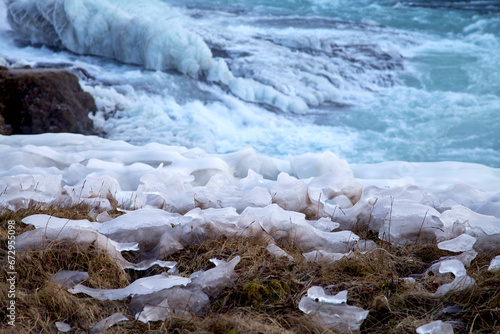 Landscape photo of icy seashore. Beautiful view on frozen water