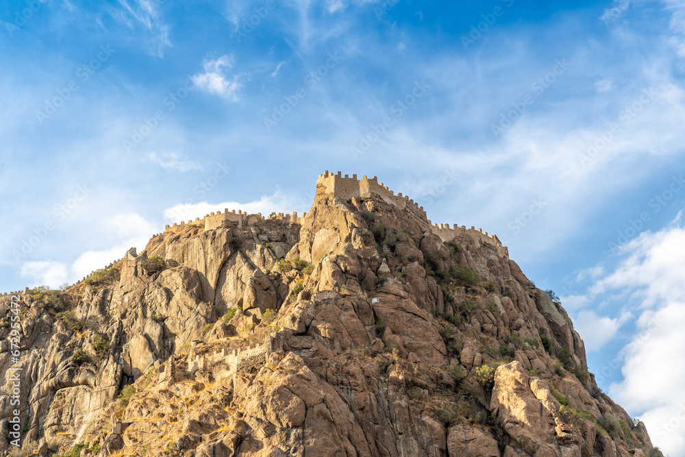 Naklejka premium Afyon (Afyonkarahisar) castle. The castle on a large rock mass is the famous symbol of Afyon. Turkey