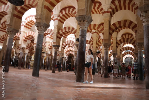 Women walking in the Mosque cathedral of Cordoba, Spain, Andalusia