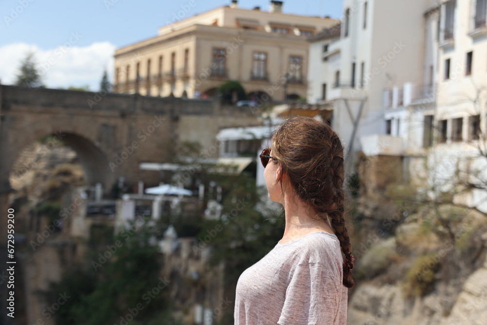 Fototapeta premium Women in front of Puente Nuevo bridge in Ronda Spain