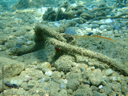 Typical illegal anchoring undersea, Aegean Sea, Greece, Halkidiki. Sea pollution and danger to divers and swimmers. 