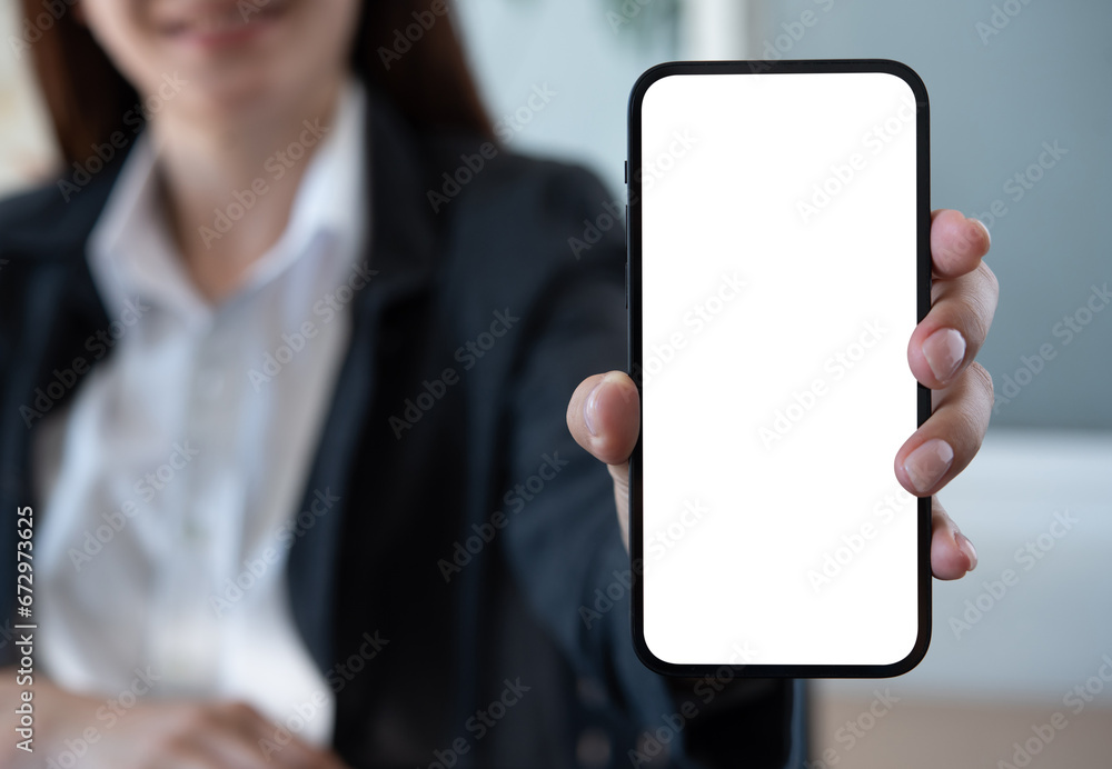 Mock up mobile phone, business woman showing blank screen mobile smartphone for social media marketing design, website template or product advertisement, front view Mock up mobile phone, business woman showing blank screen mobile smartphone for social media marketing design, website template or product advertisement, front view