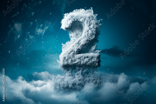 The number two in the cold, against the backdrop of winter during a snowfall. Frozen number two in the midst of the cold season. A giant number two in the cold