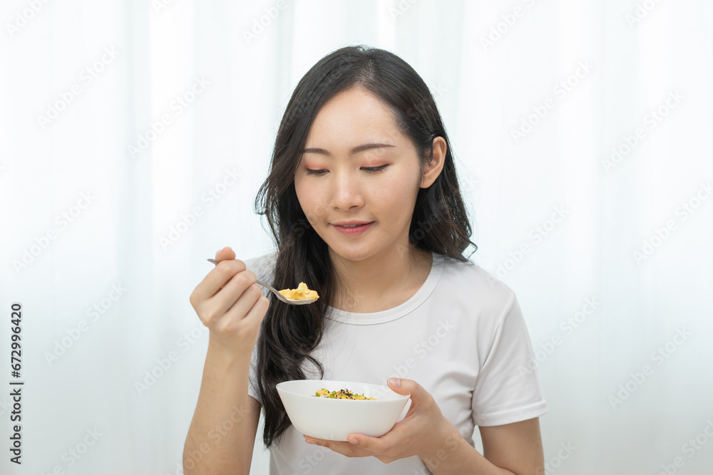 young female planning menu to eat ketogenic diet during weight loss program. young female planning menu to eat ketogenic diet during weight loss program.