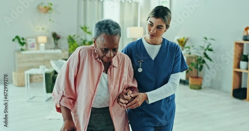Nurse, senior woman and walking stick for physiotherapy support and healthcare service in clinic office. Physiotherapist, medical worker or doctor helping elderly patient with disability and mobility photo