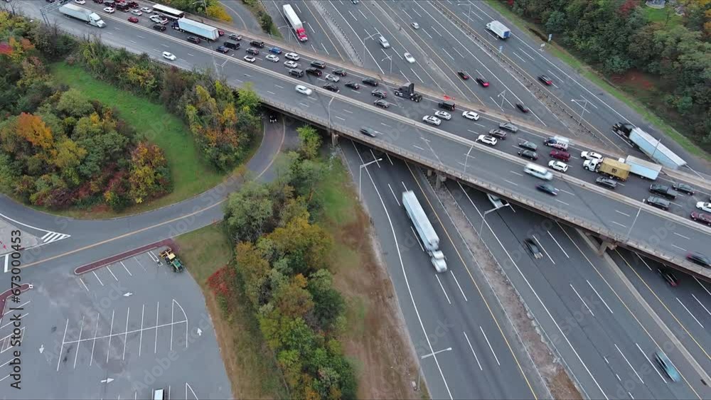 View from top of an traffic jam backed up highway during rush hour during heavy traffic View from top of an traffic jam backed up highway during rush hour during heavy traffic