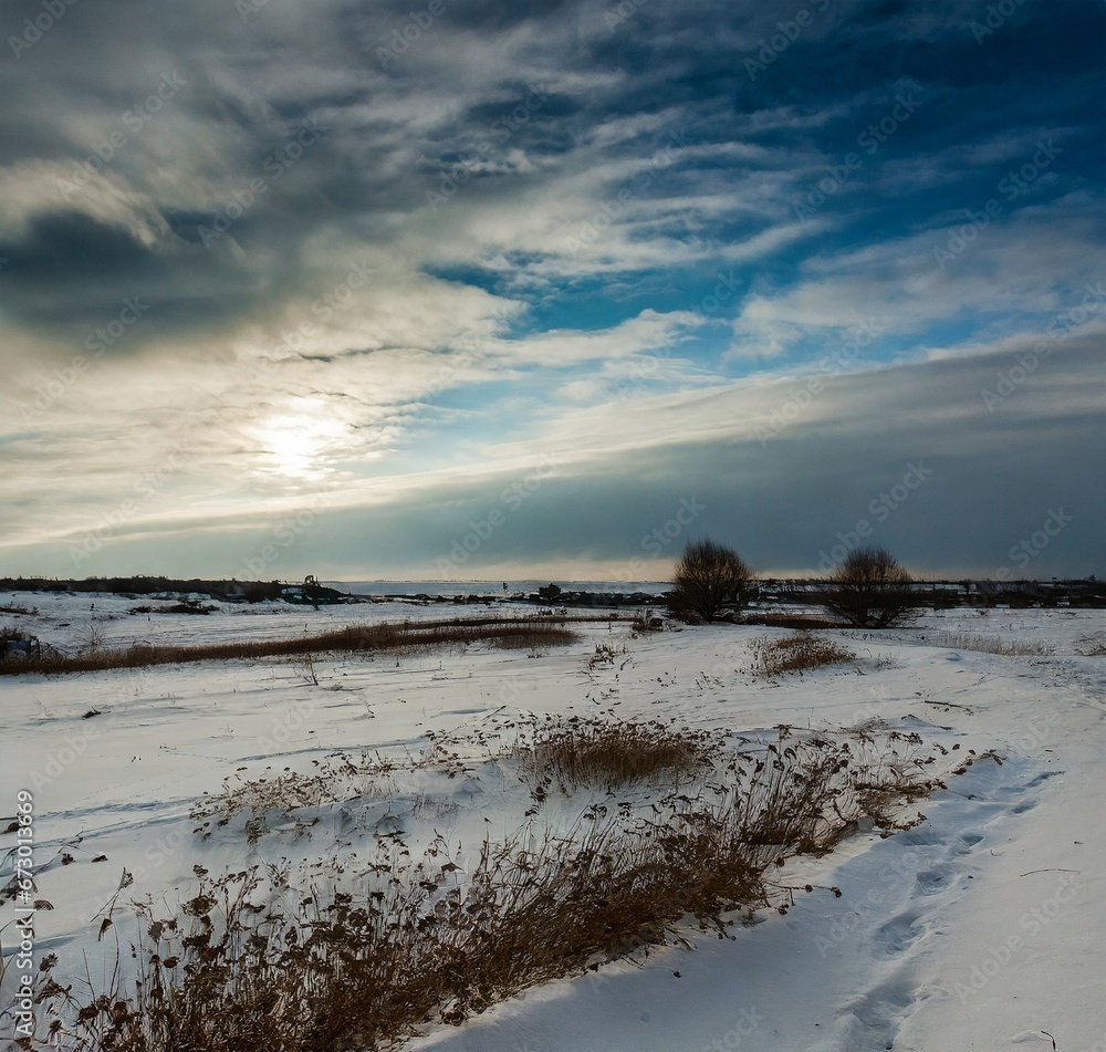 Bright snowy field under winter sun. Bright snowy field under winter sun.