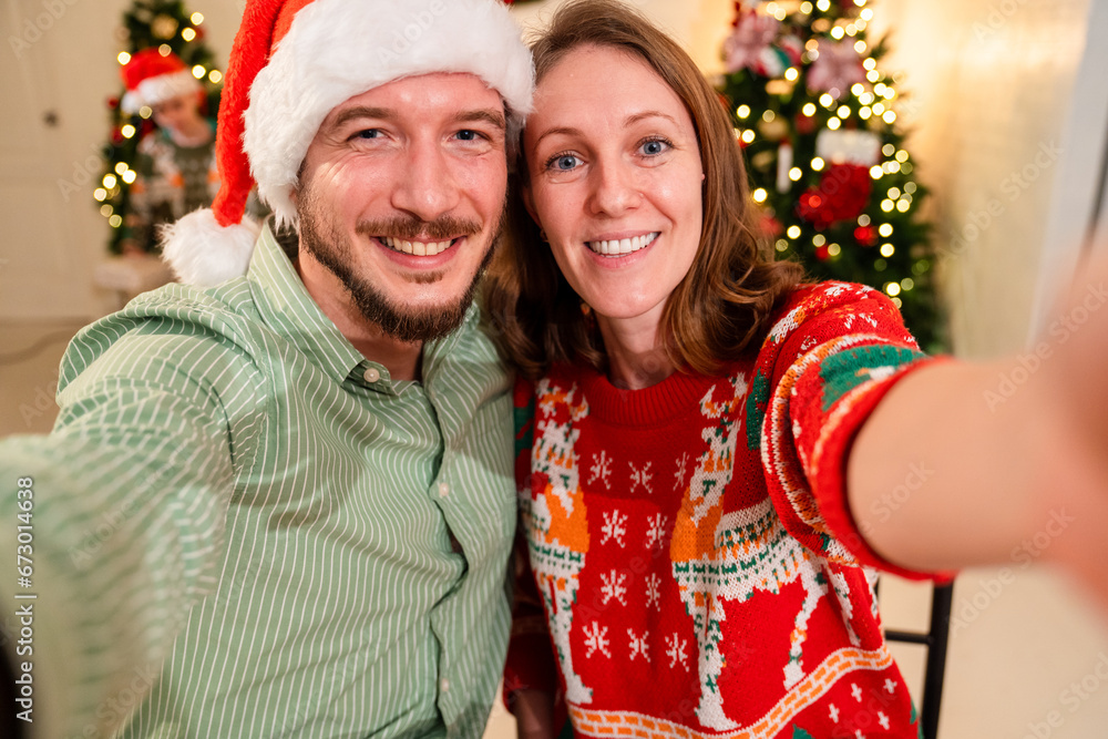happy sweet couple having selfie video call with family while celebrating christmas party in house, caucasian people family celebrate festive holiday thanksgiving, X-mas eve together at home happy sweet couple having selfie video call with family while celebrating christmas party in house, caucasian people family celebrate festive holiday thanksgiving, X-mas eve together at home