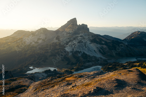 Black Tusk sunset view while hiking in Panorama Ridge trail. Mountain sunset view with alpine lakes