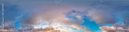 Full zenith sunset sky panorama with pink Cumulus clouds in seamless hdr equirectangular format, perfect for 3D visualization and virtual reality projects. © panophotograph