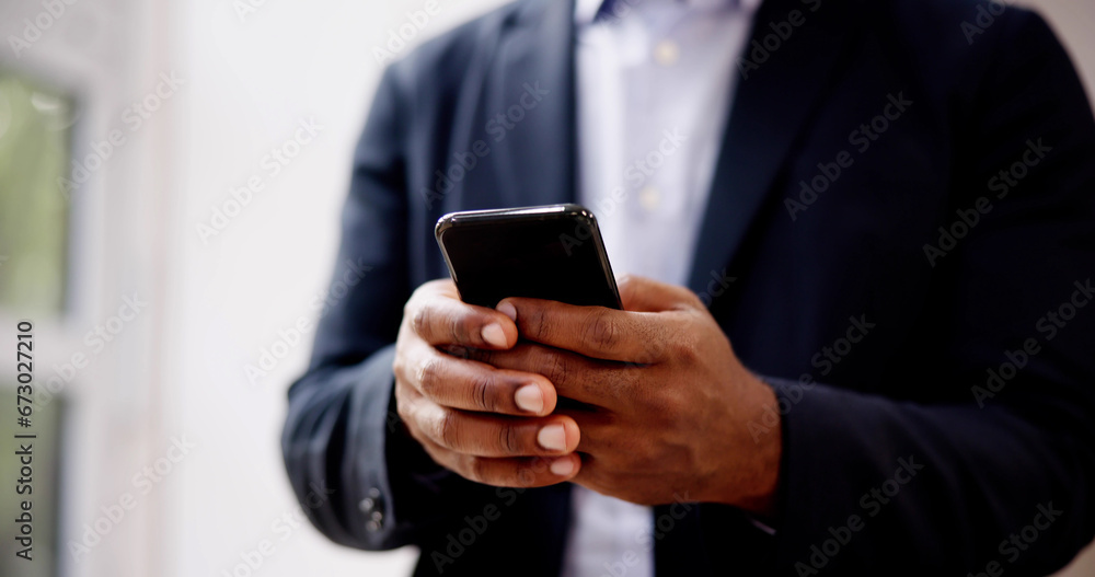 African Man Holding Smartphone African Man Holding Smartphone