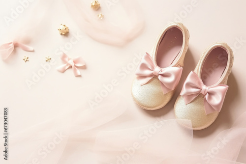 Cute little baby shoes of new born on empty background for baby shower invitation with space for text
