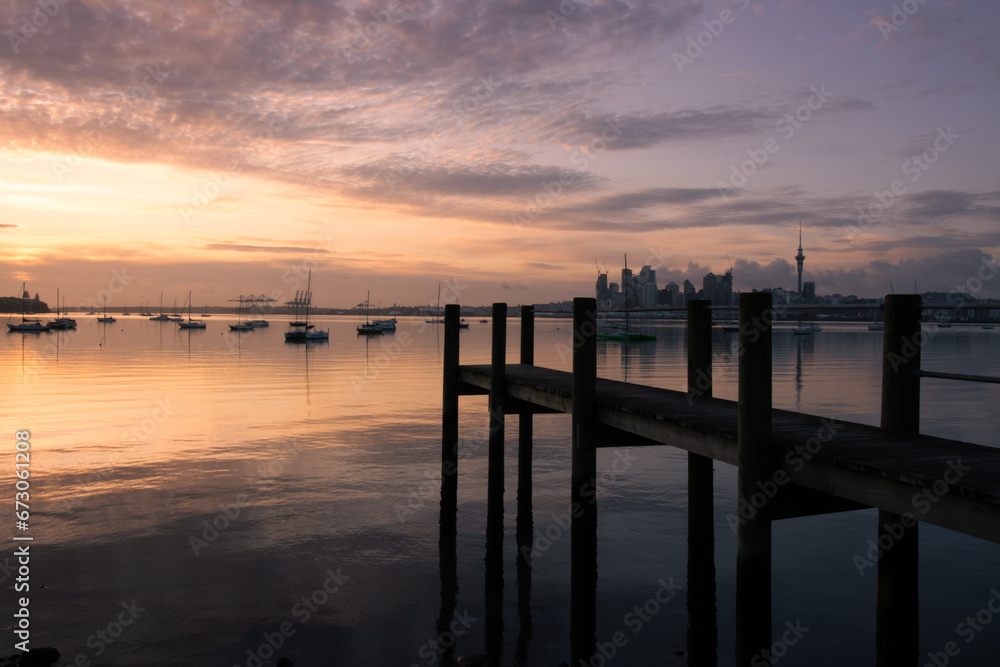 Auckland Harbour jetty sunrise.