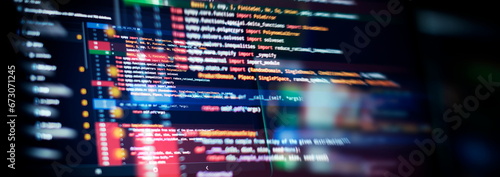Running Computer data programming. Coding script text on screen. photo
