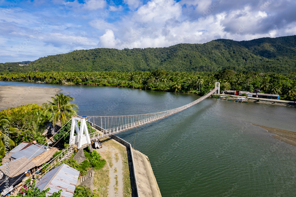 Aerial of the Baler Hanging bridge crossing the Tibag-Sabang River.