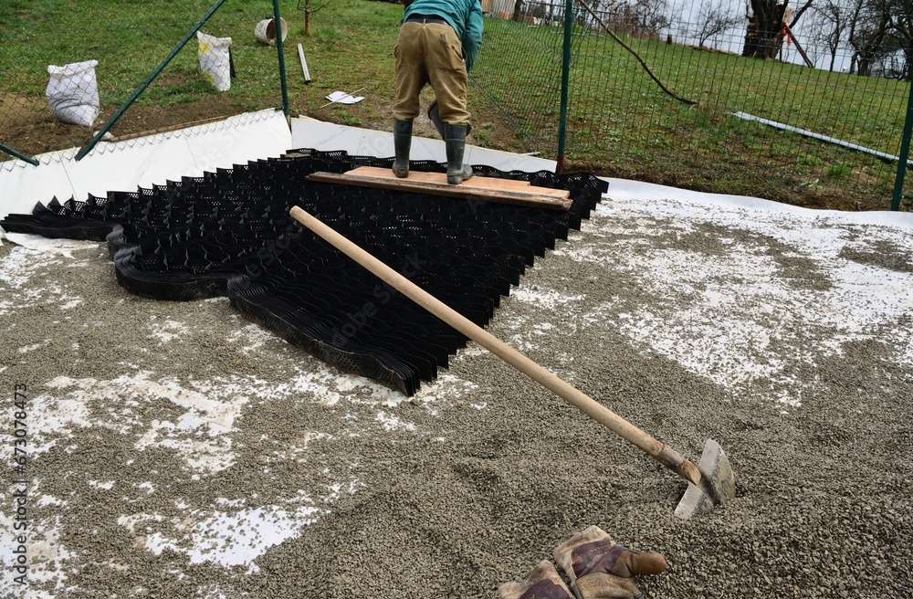 Ecological build of the car parking using crushed stone and plastic mesh without the use of concrete