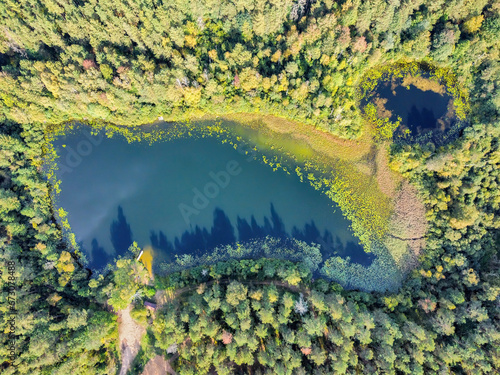 Aerial view of a lake in the forests of Lithuania, wild nature. The name of the lake is "Paperlojo", Varena district, Europe.