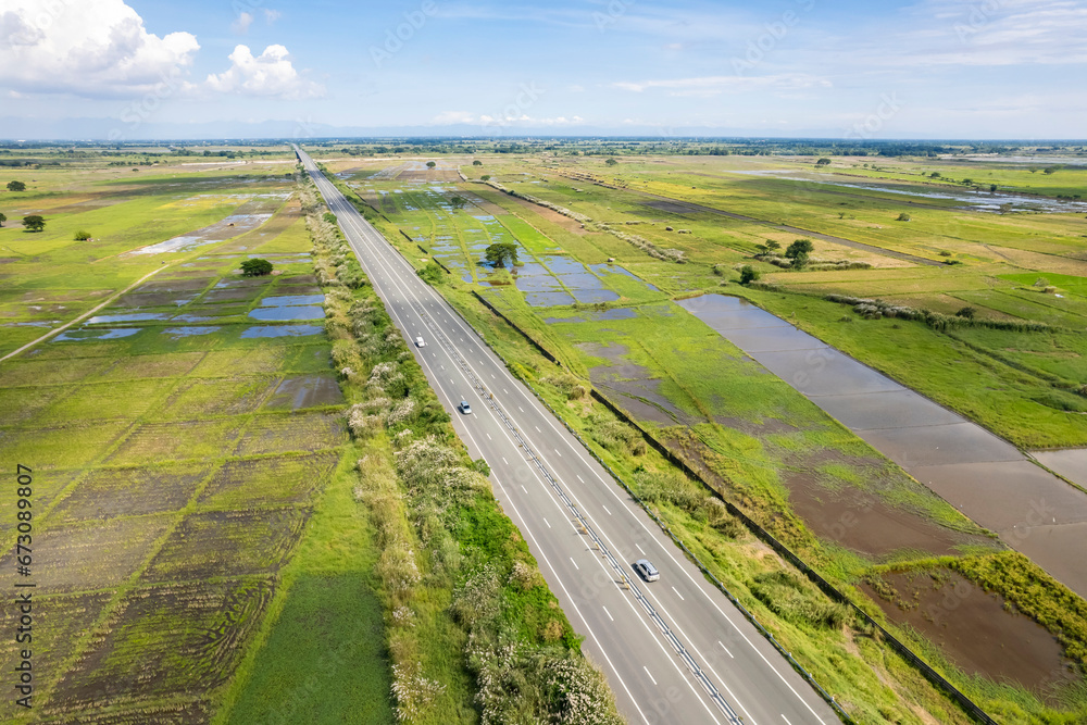 Aerial of Central Luzon Link Expressway , better known by its acronym CLLEX, stretching from La Paz, Tarlac to Nueva Ecija.
