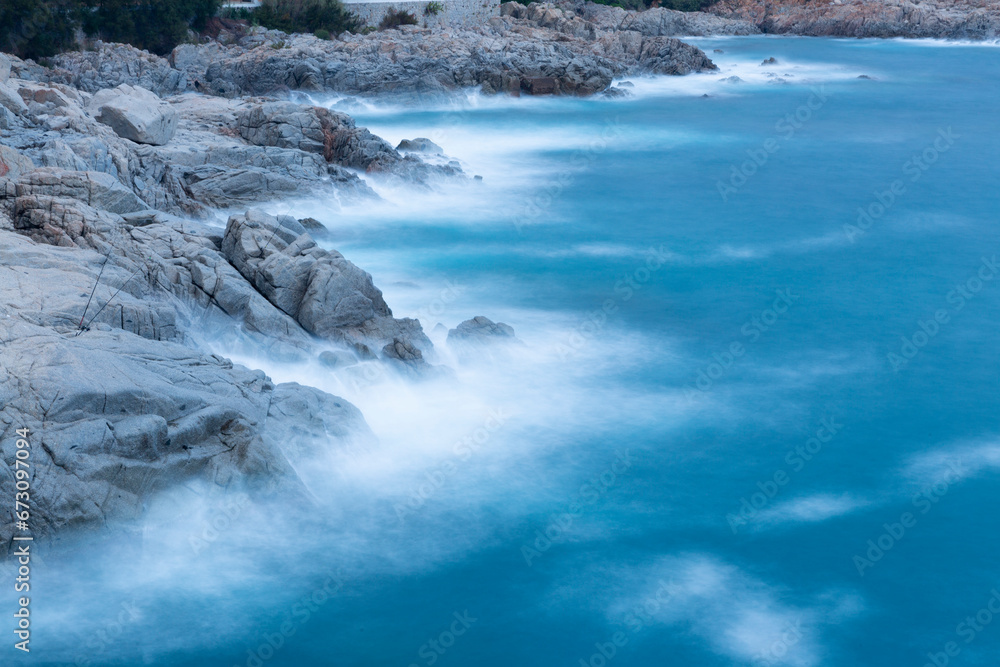 the sea crashing against the rocks the sea crashing against the rocks