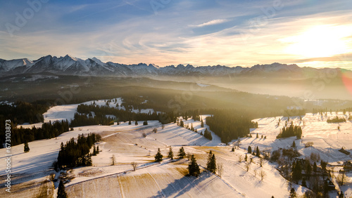 The Tatra Mountains from afar in winter.