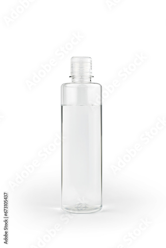 Transparent bottle on white background