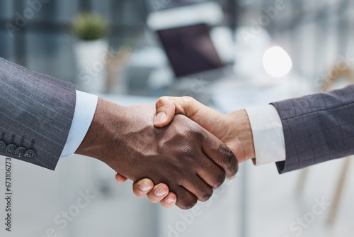 Business shaking hands, finishing up meeting. Successful businessmen handshaking after good deal