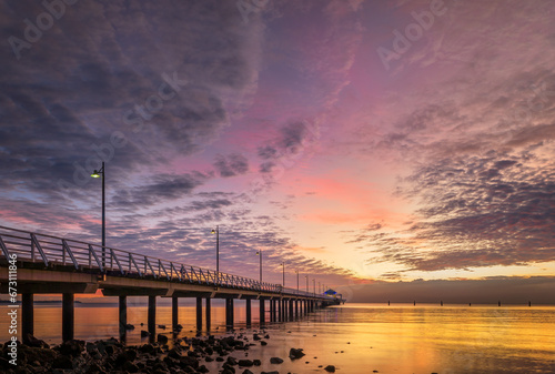 Sunrise through Pier