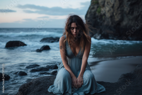 Sad woman, stress or depression by beach, sea environment or nature ocean with bipolar, loneliness or burnout, Mental health, anxiety or confused person crying with doubt, crisis fail or bad problem © alisaaa