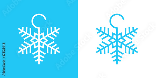 Moda de temporada de invierno. Logo para boutique de ropa. Silueta de copo de nieve con gancho de percha para la ropa