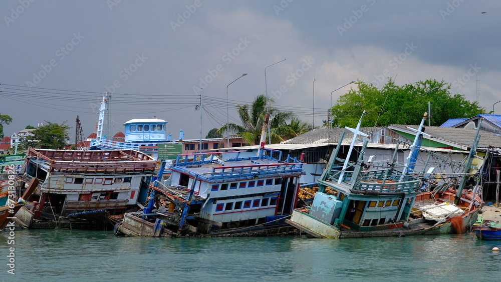 Old fishing boats wrecked at Ban Phe pier. Old fishing boats wrecked at Ban Phe pier.