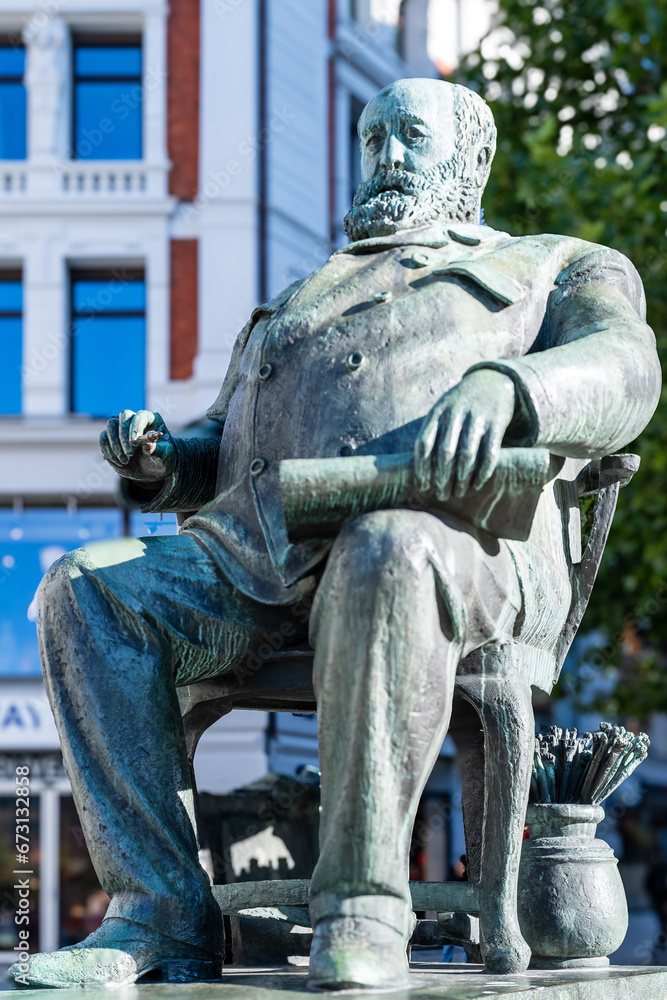 Oslo, Norway, Stortings plass: Statue of Christian Krohg. Christian Krohg was a Norwegian naturalist, painter, illustrator, author and journalist.