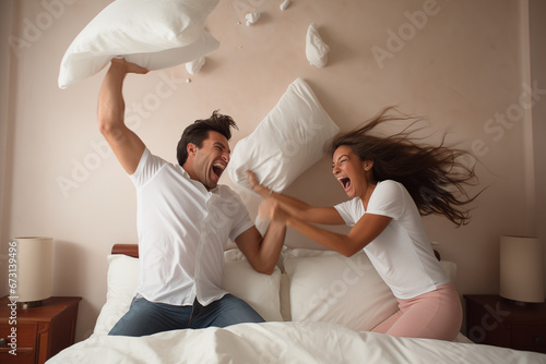 A playful pillow fight between a loving couple, signifying the fun and humor in relationships, creativity with copy space