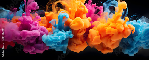 abstract colorful background with exploding paint colors in the air