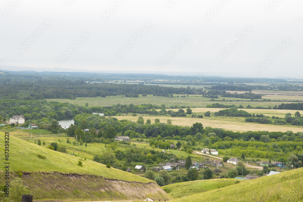A Picturesque View of the Countryside from a Hilltop