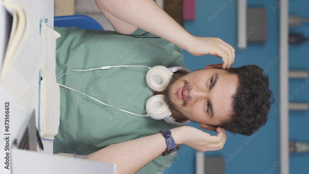 Vertical video of Excited male student impatient. Vertical video of Excited male student impatient.
