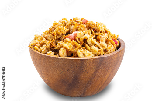 Delicious crunchy muesli with strawberry and raspberry in wooden bowl isolated on white background with clipping path.