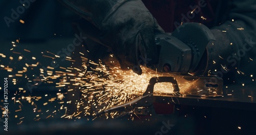 Worker Using Industrial Grinder Metalwork Industry © volf anders