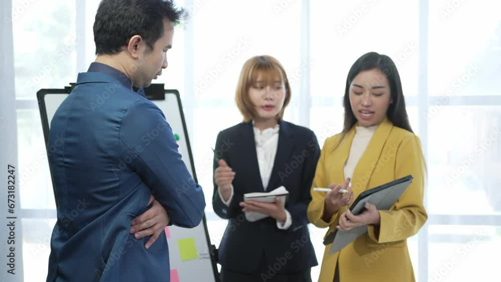 A team of Asian businessmen is discussing the company's sales report in a meeting. A group of young Asian businessmen is brainstorming to discuss new business development planning strategies. A team of Asian businessmen is discussing the company's sales report in a meeting. A group of young Asian businessmen is brainstorming to discuss new business development planning strategies.